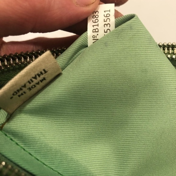 Coach double zipper green leather wristlet clutch